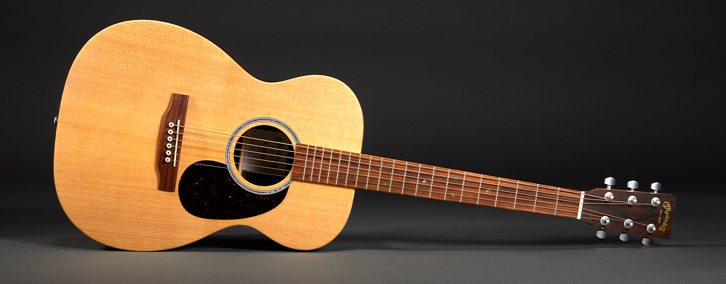 Photo of an acoustic guitar on its side Photo of an acoustic guitar on its side